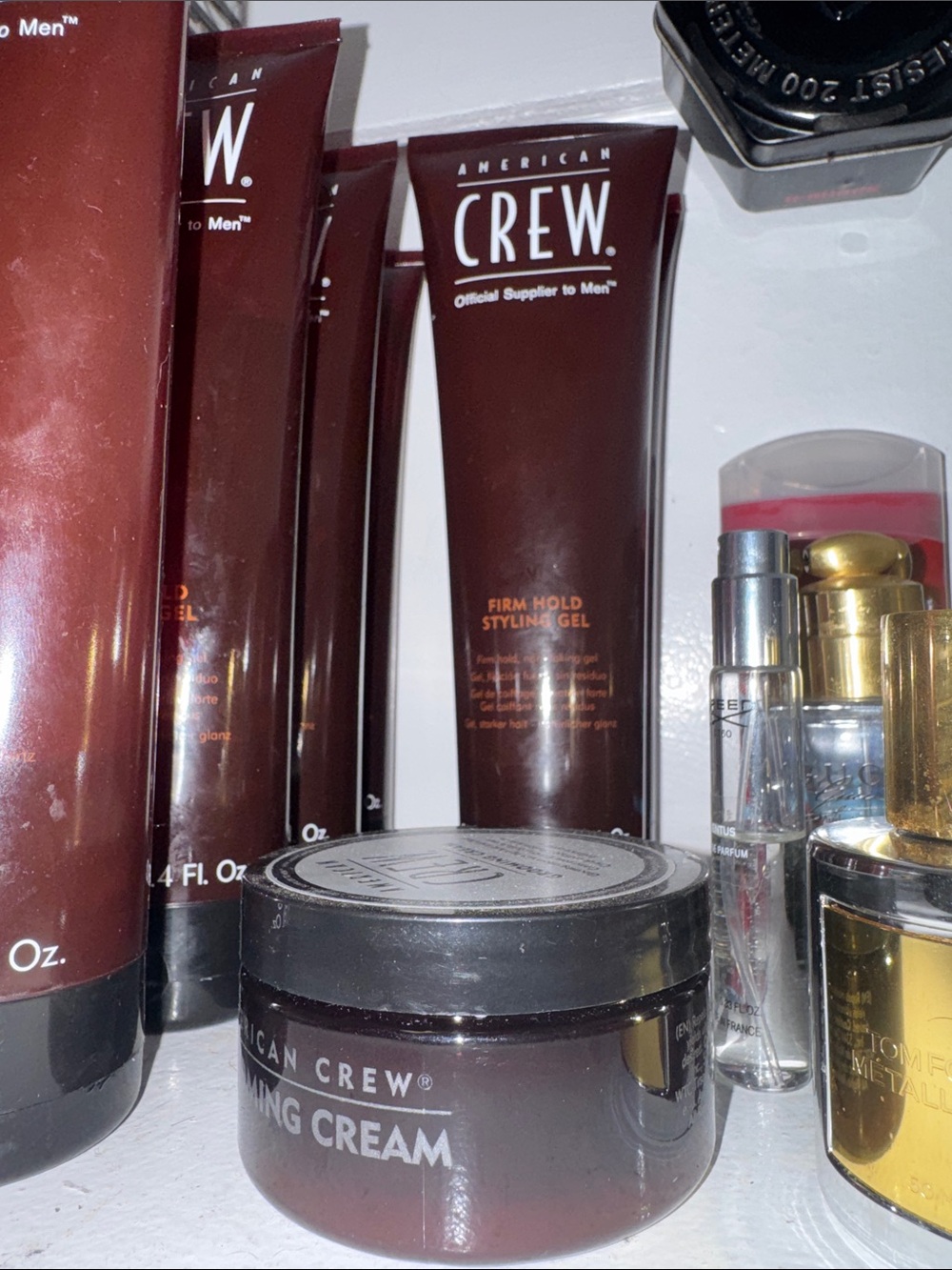 American Crew Products for men. Firm Hold Styling Gel - works well.